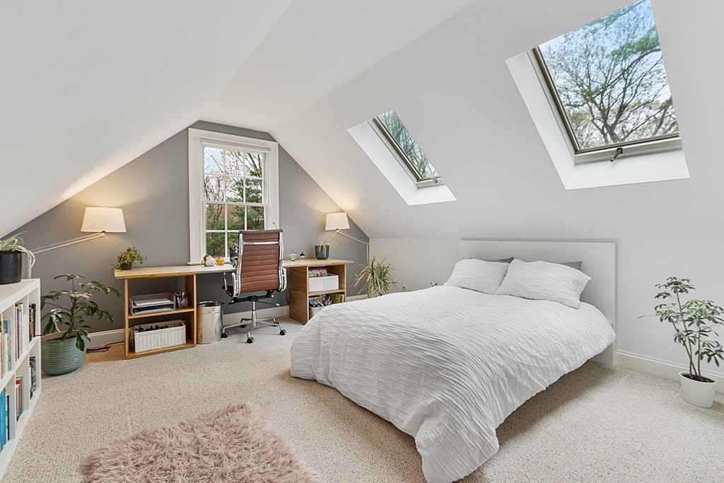 257 Nashoba Road Concord, MA 01742 - Photo 27 of 41 a bedroom with a bed furniture and a window