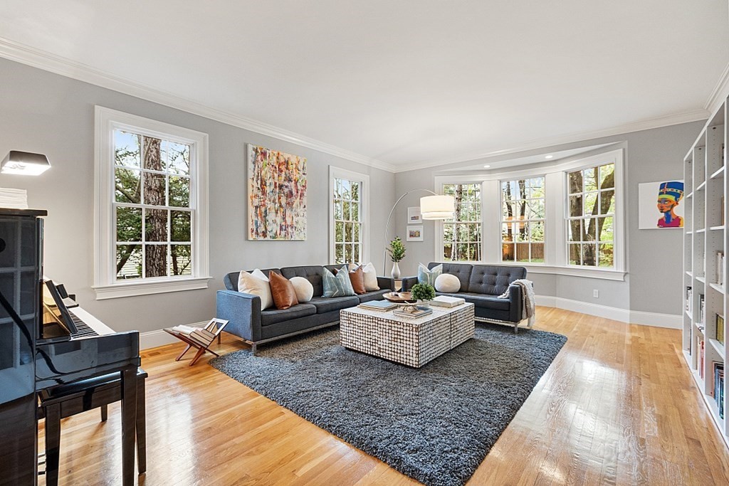 257 Nashoba Road Concord, MA 01742 - Photo 7 of 41 a living room with furniture and a large window