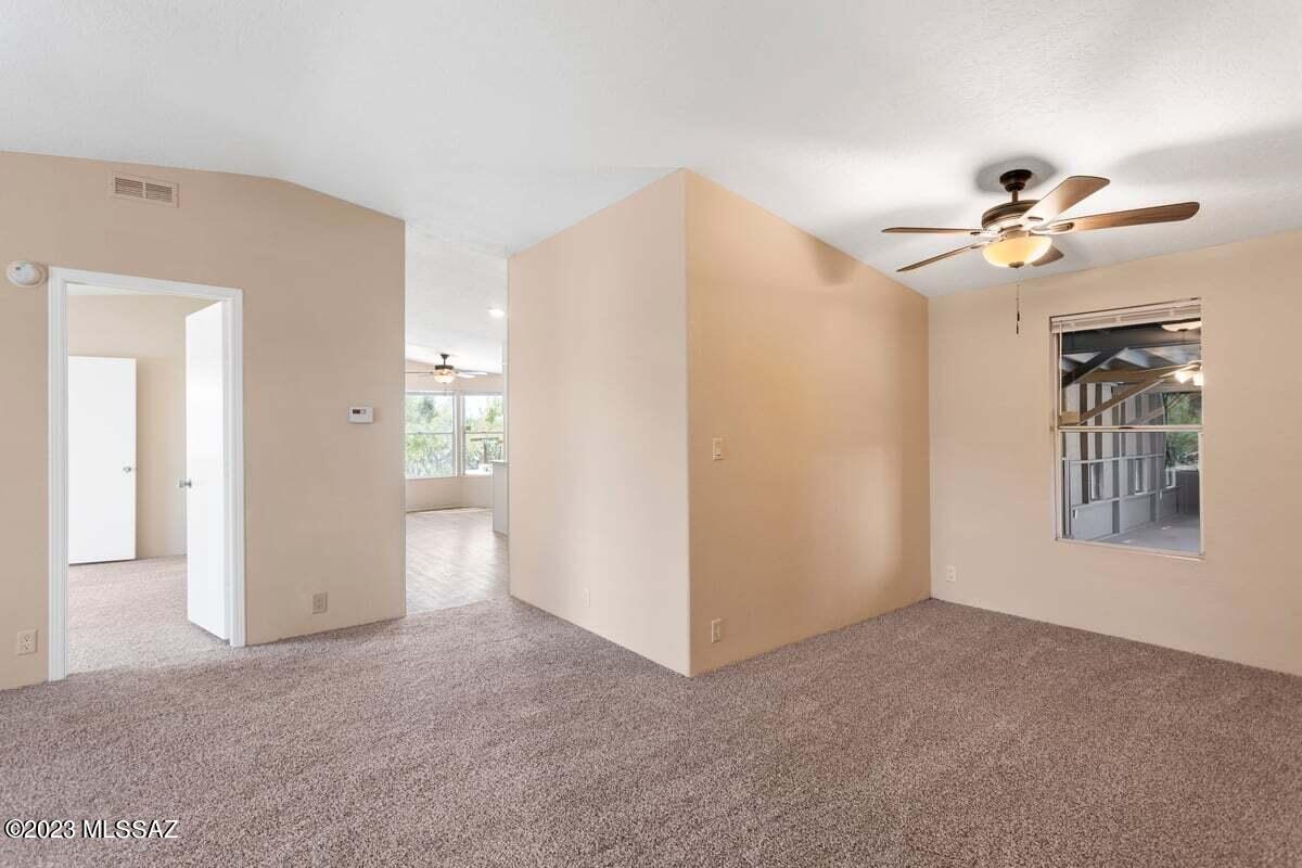 7725 North Van Ark Road Tucson, AZ 85743 - Photo 7 of 25 VA lvng to kitchen