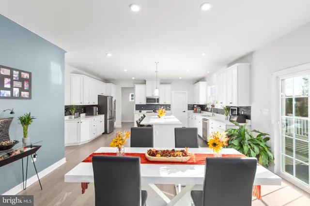 a workspace with furniture and a window