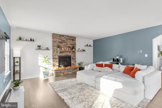 a spacious bedroom with a bed and a flat screen tv