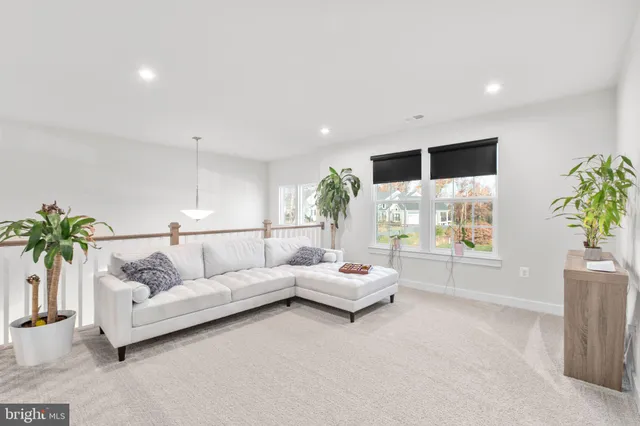 a spacious bathroom with a double vanity sink mirror and shower