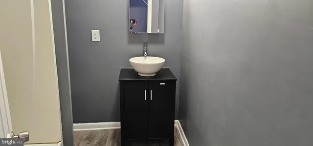 a bathroom with a sink and a toilet