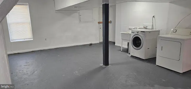a utility room with dryer and washer