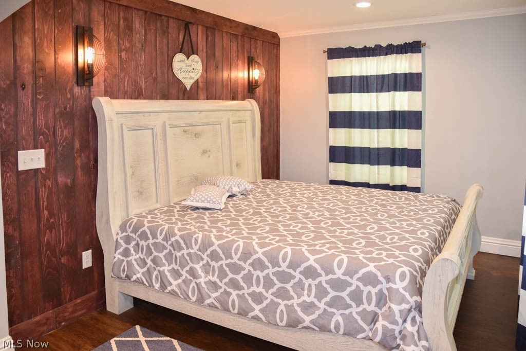 9410 Leroy Road Seville, OH 44273 - Photo 13 of 25 Wood plank accent wall in the master suite.