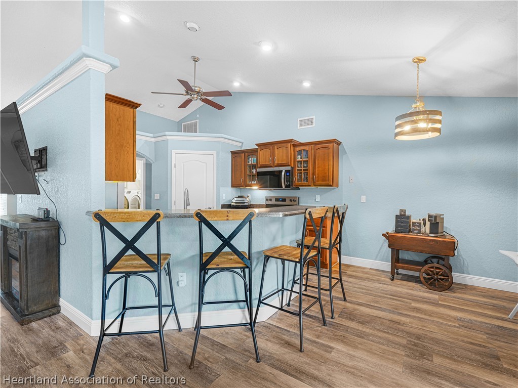 5430 Lakewood Road Sebring, FL 33875 - Photo 12 of 40 Breakfast Bar - view from Breakfast Nook to Kitchen