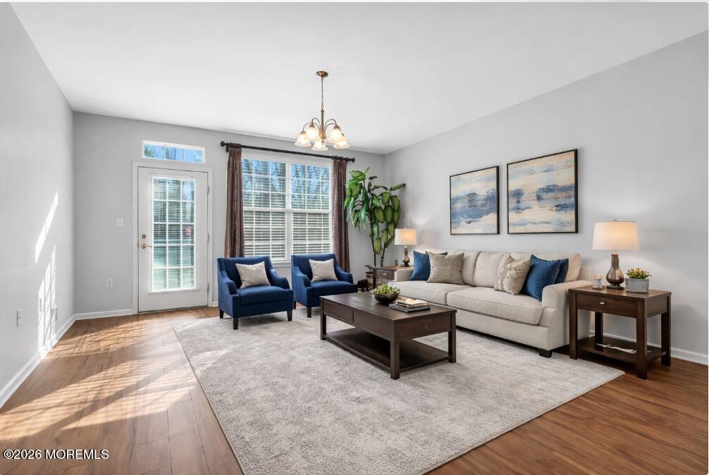 18 Hartack Road Manalapan, NJ 07726 - Photo 17 of 36 a living room with furniture and a large window