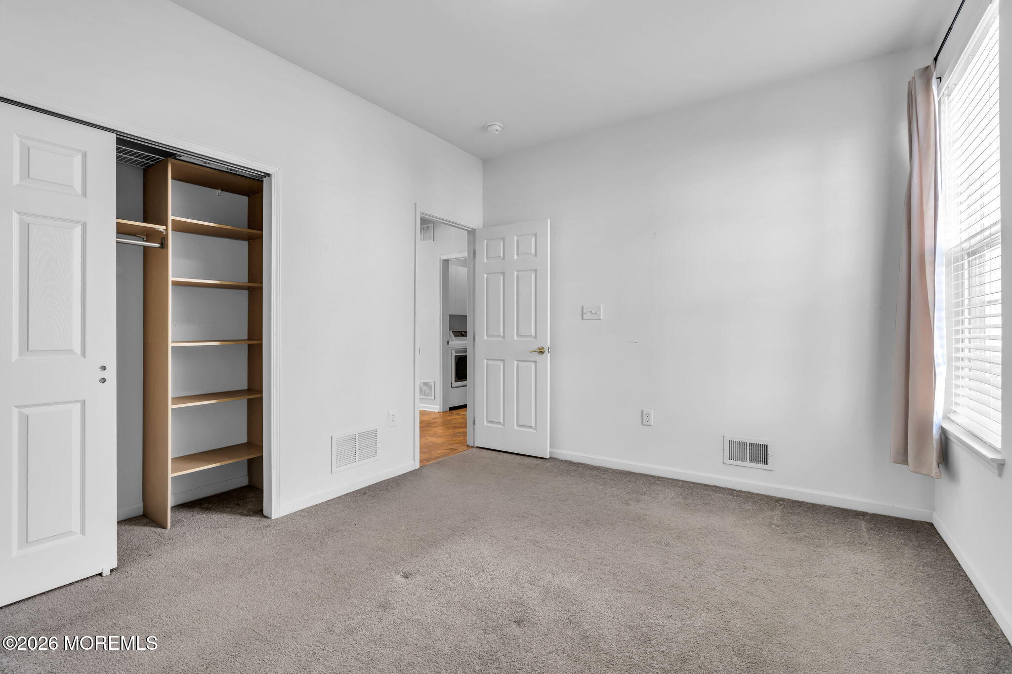 18 Hartack Road Manalapan, NJ 07726 - Photo 27 of 36 an empty room with windows