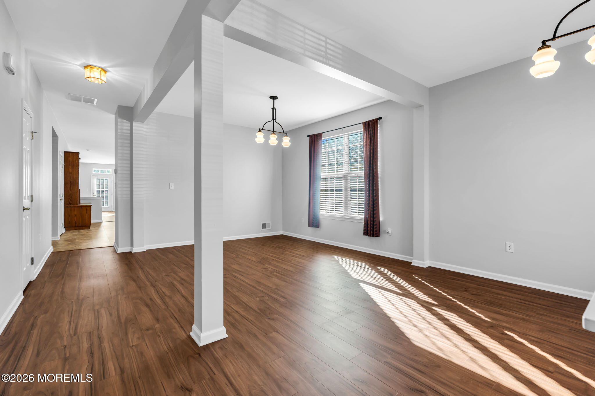 18 Hartack Road Manalapan, NJ 07726 - Photo 4 of 36 wooden floor in an empty room with a window