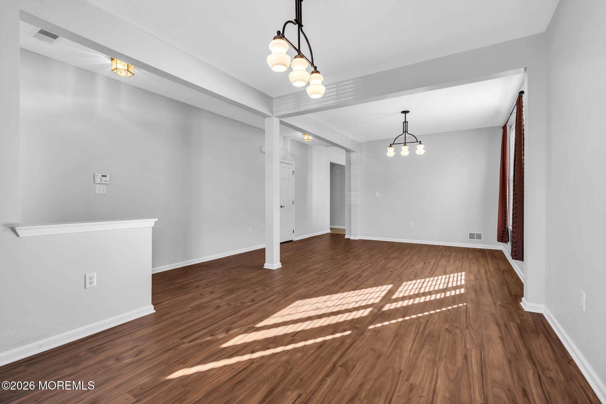 18 Hartack Road Manalapan, NJ 07726 - Photo 7 of 36 a view of empty room with wooden floor