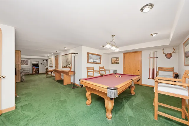 a bedroom with furniture and a fireplace