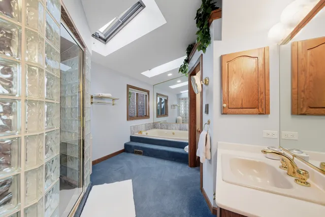 a living room with furniture pool table and a large window
