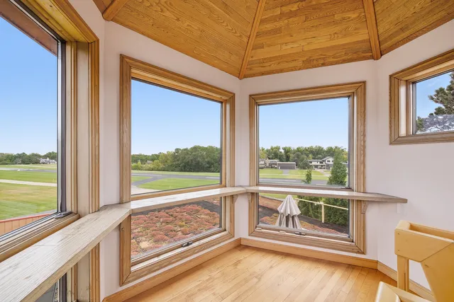 a view of a house with a street