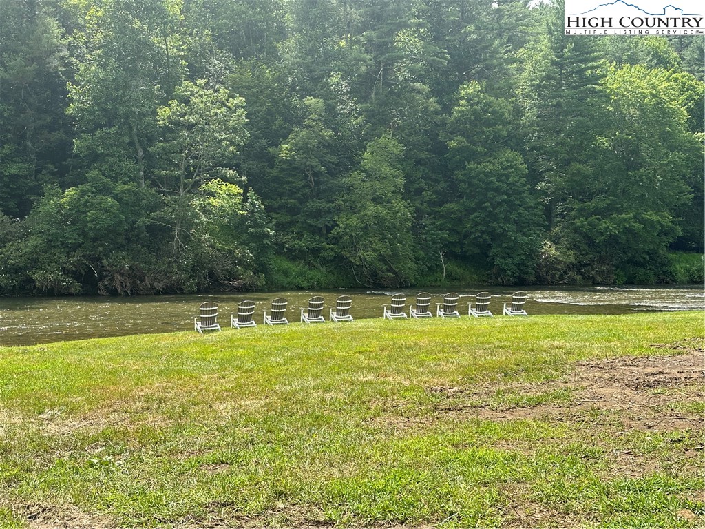 Sunrise Way Jefferson, NC 28640 - Photo 9 of 9 a view of a swimming pool with a yard