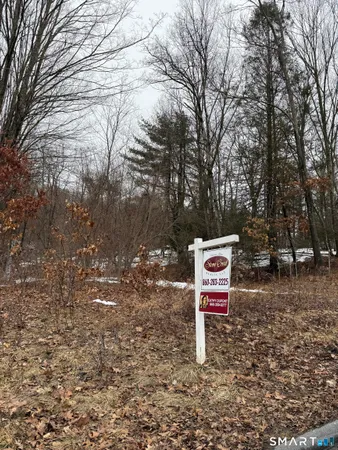 a sign on the side of the road