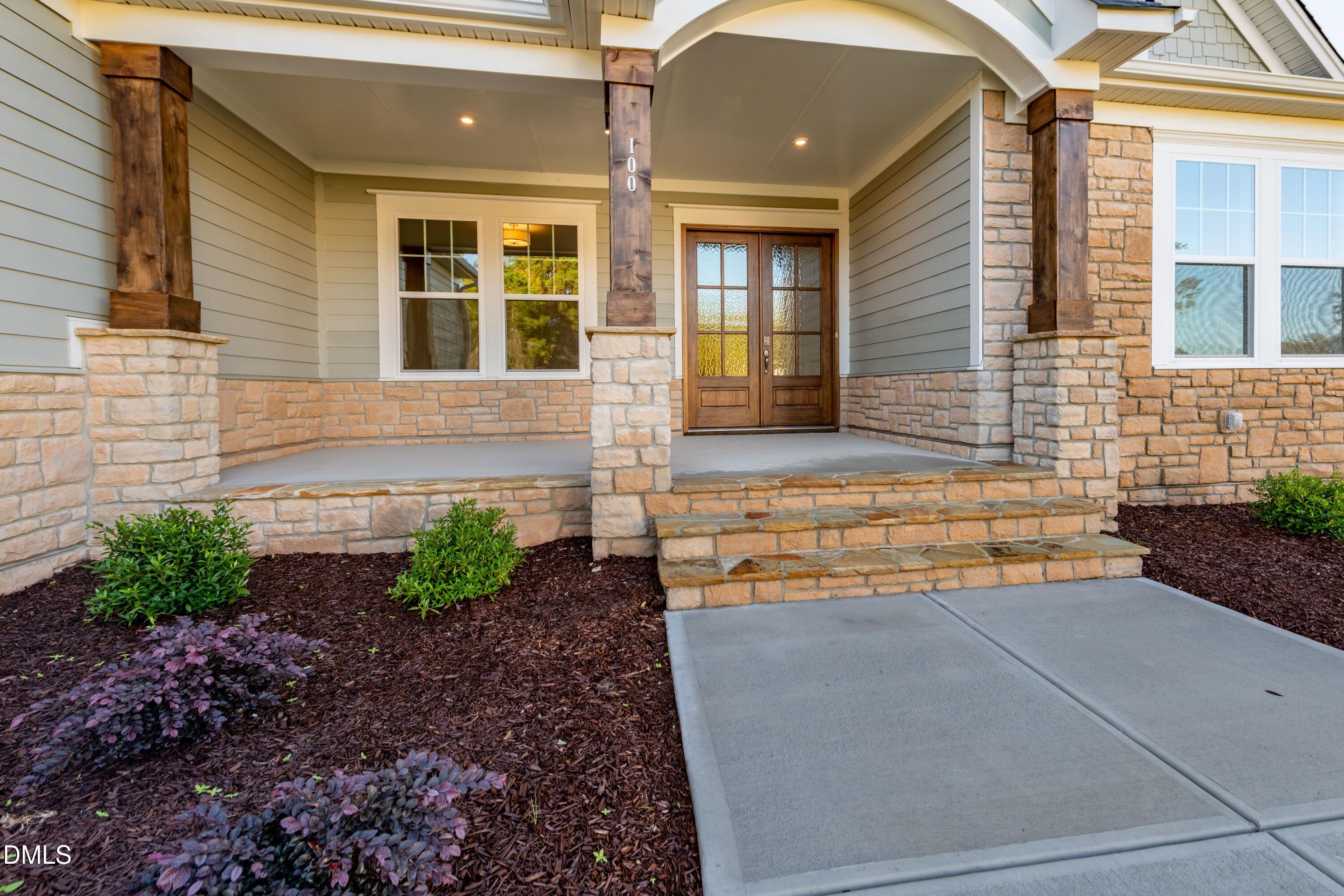 1 Wolf Tree Way Efland, NC 27243 - Photo 2 of 32 a front view of a house with garden