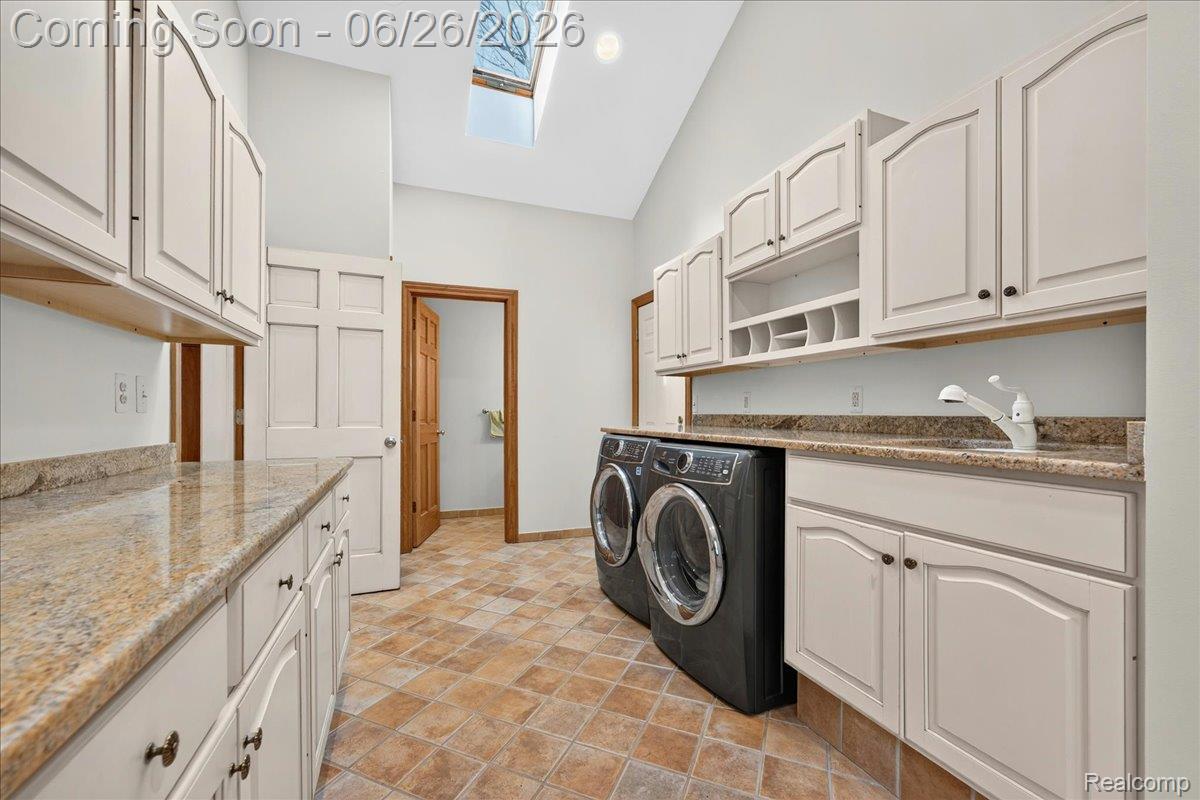 29498 East River Road Grosse Ile, MI 48138 - Photo 17 of 66 First Floor Laundry / Mud Room with Door to Garage and Side