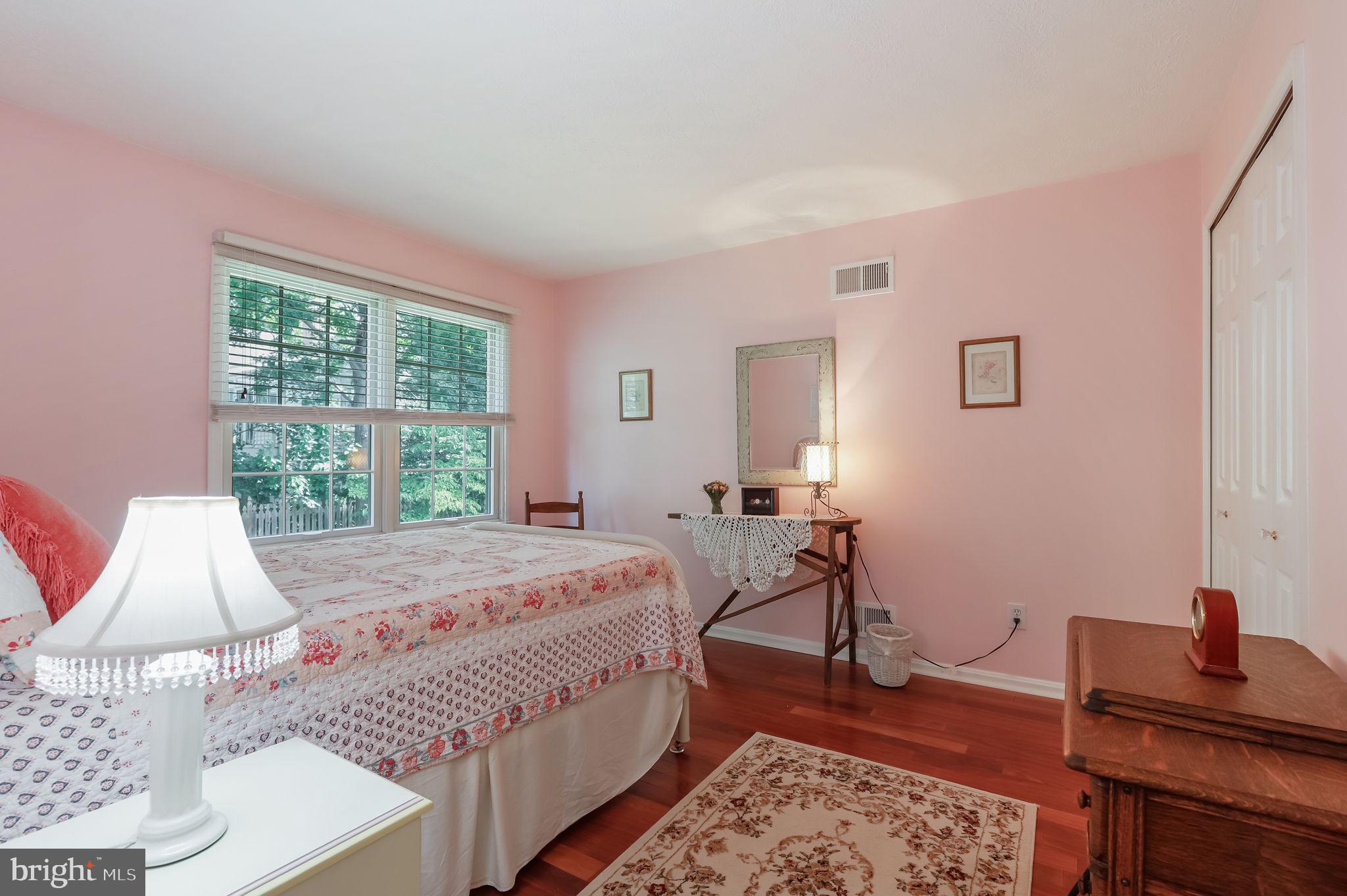 12705 Ruxton Road Silver Spring, MD 20904 - Photo 29 of 44 a bedroom with a bed and a window