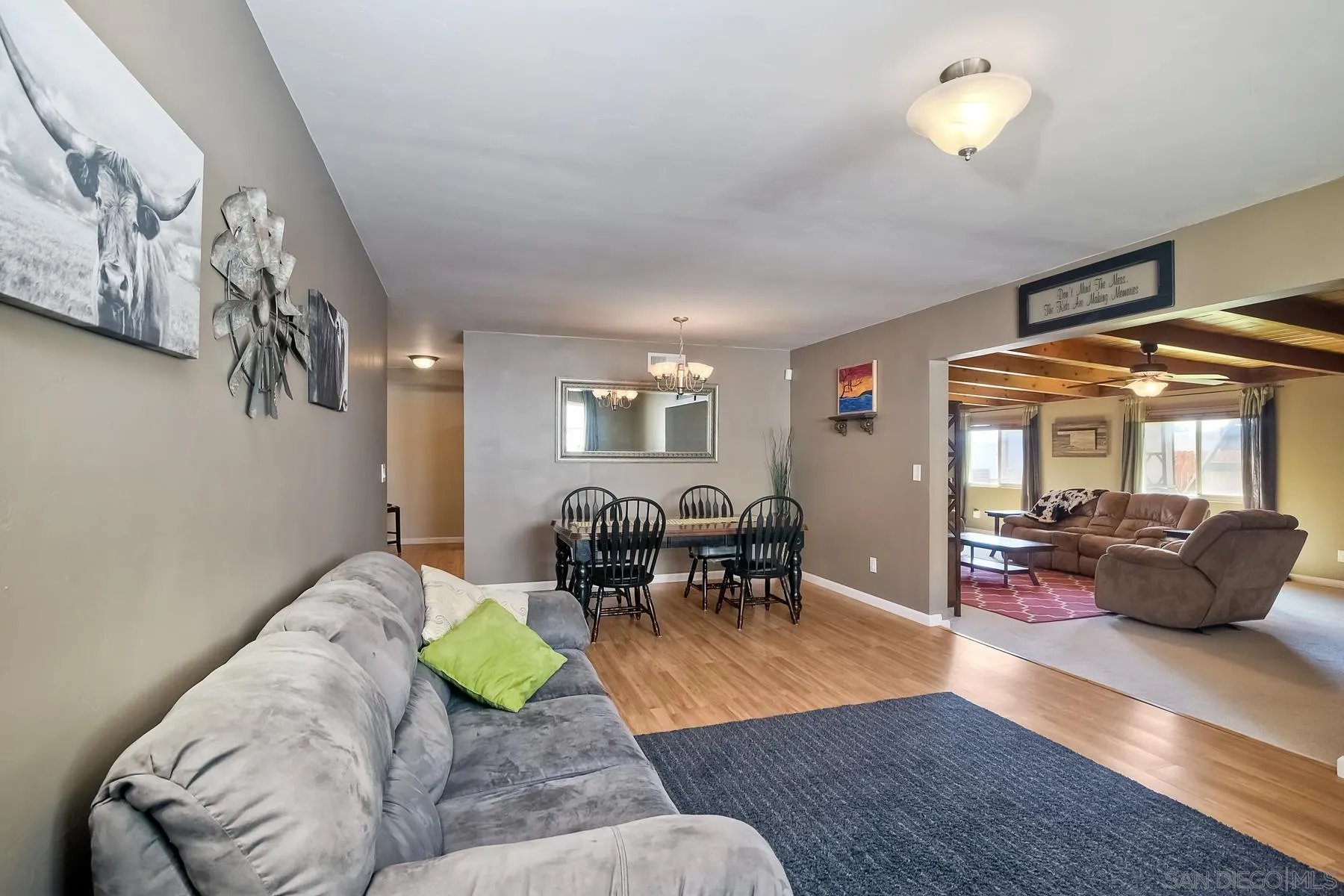 2162 Rising Glen Way San Diego, CA 92139 - Photo 12 of 48 a living room with furniture and wooden floor