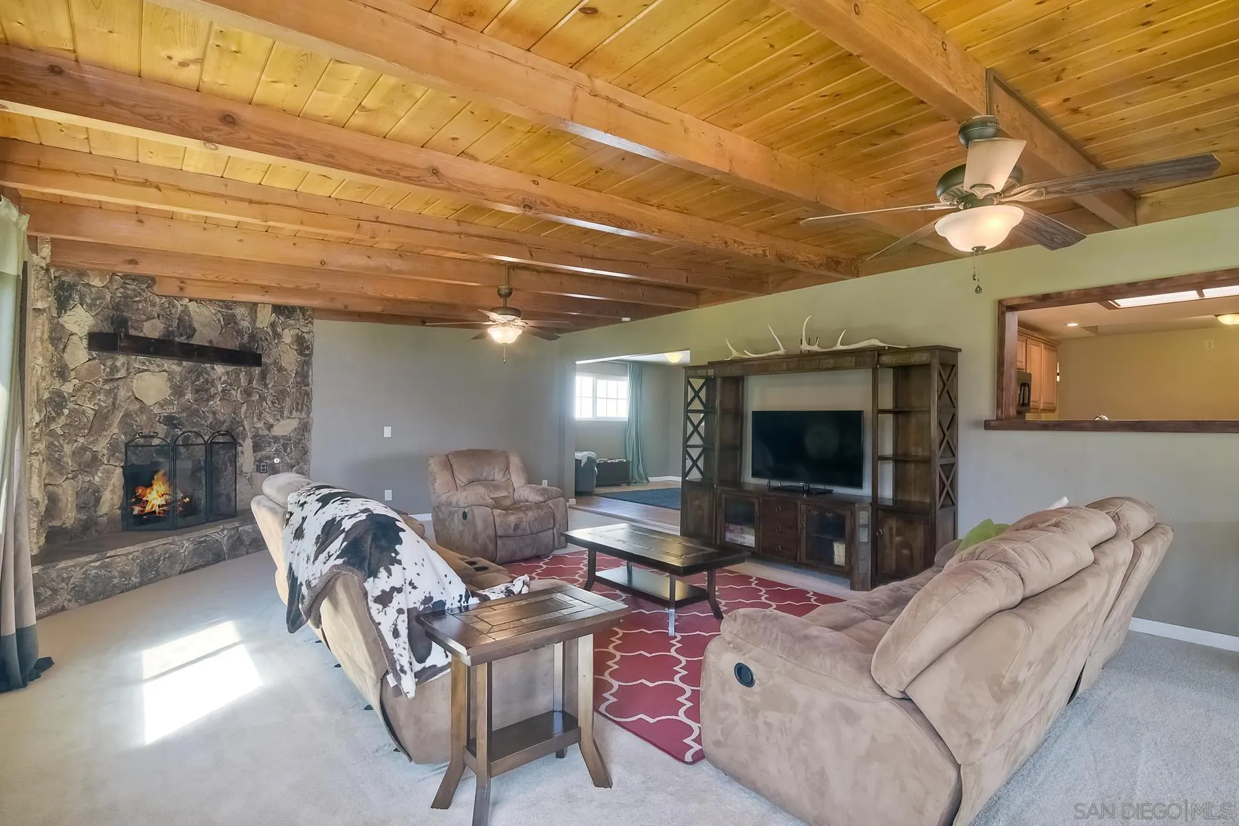2162 Rising Glen Way San Diego, CA 92139 - Photo 15 of 48 a living room with furniture and a flat screen tv
