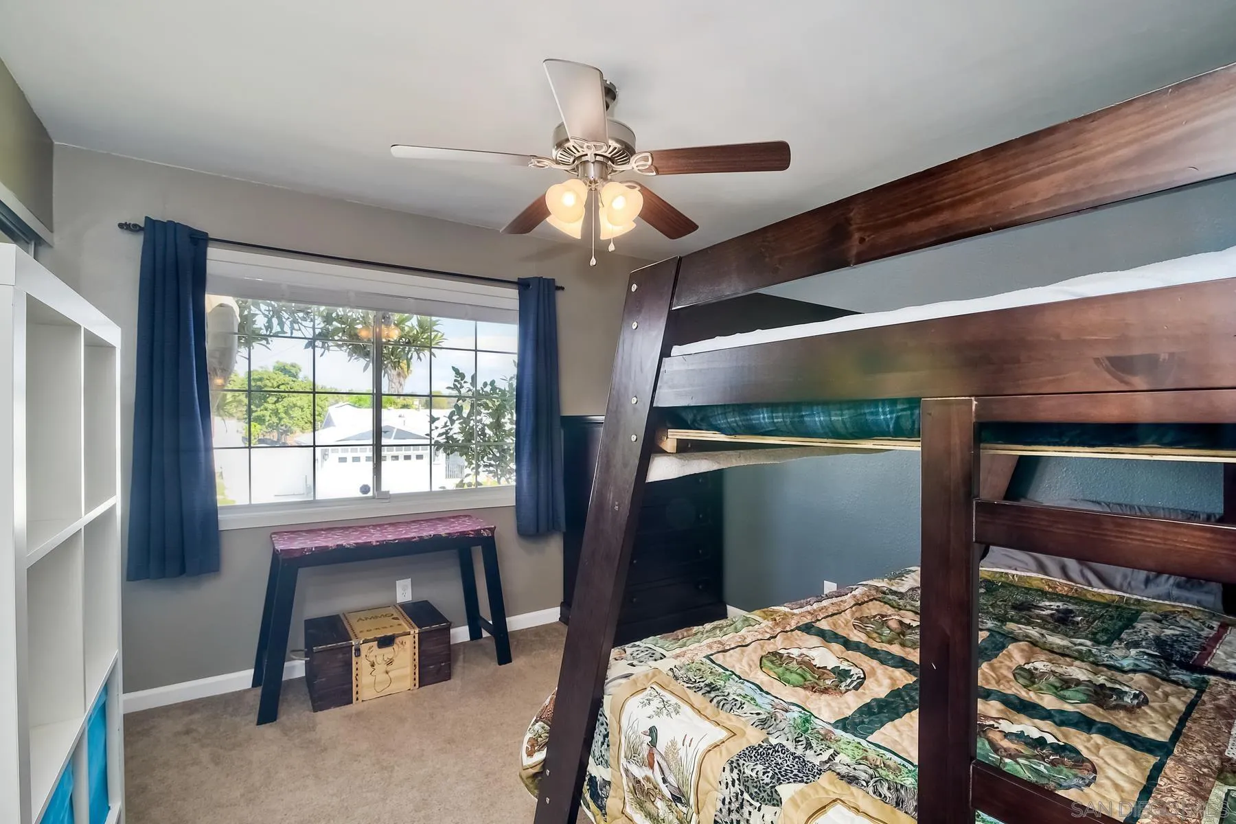 2162 Rising Glen Way San Diego, CA 92139 - Photo 19 of 48 a bedroom with a bed and a window
