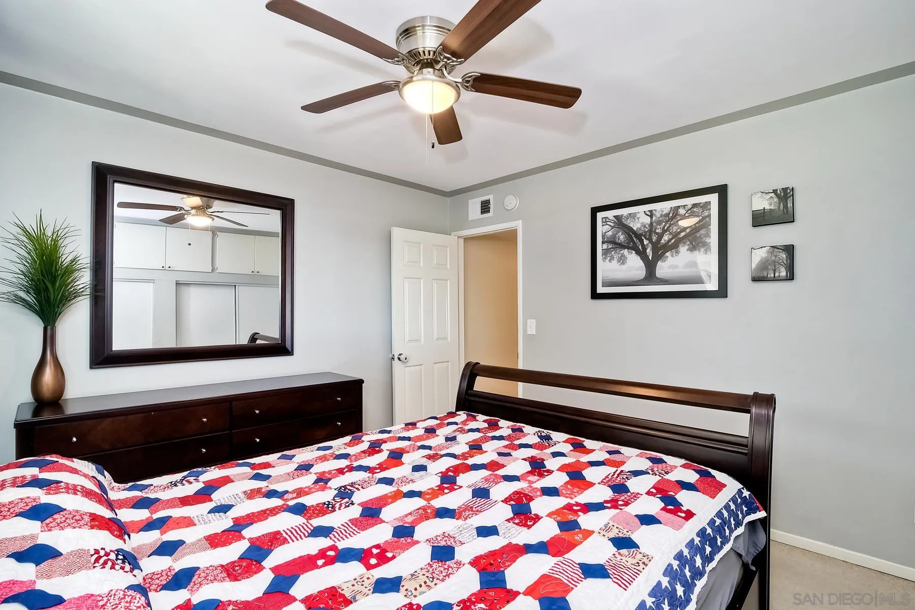 2162 Rising Glen Way San Diego, CA 92139 - Photo 25 of 48 a bedroom with a bed and a window