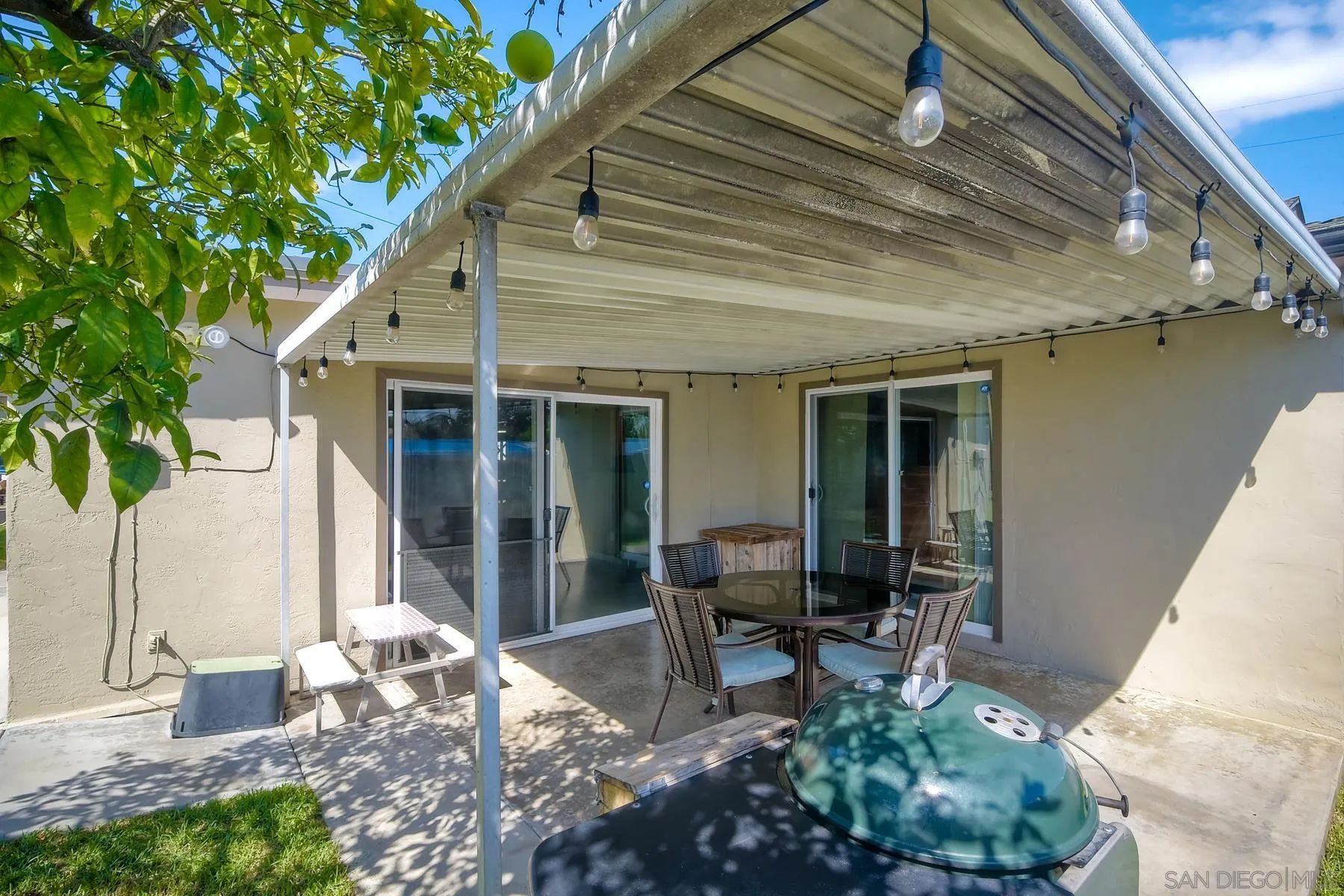 2162 Rising Glen Way San Diego, CA 92139 - Photo 26 of 48 a backyard of a house with outdoor seating