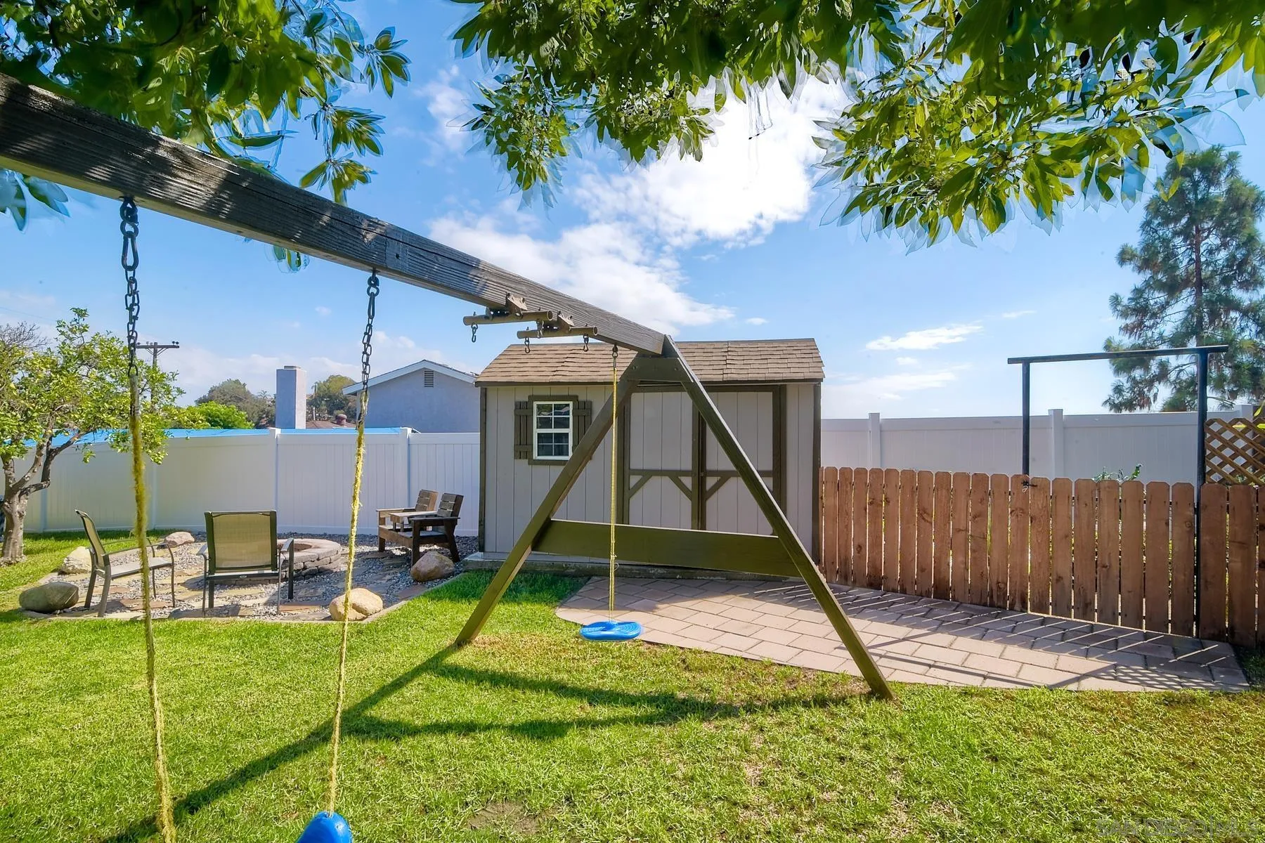 2162 Rising Glen Way San Diego, CA 92139 - Photo 30 of 48 a view of a backyard with a slide