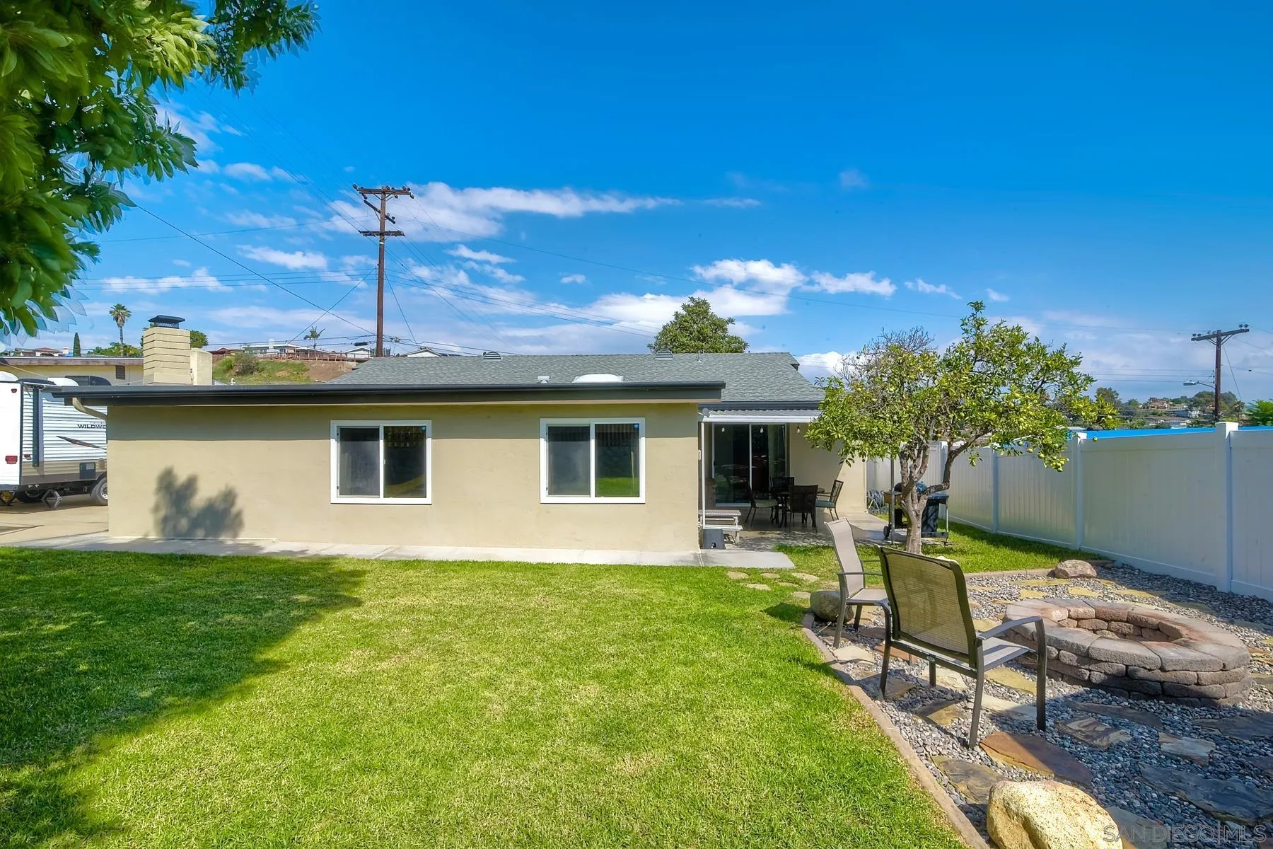 2162 Rising Glen Way San Diego, CA 92139 - Photo 31 of 48 a house view with a garden space