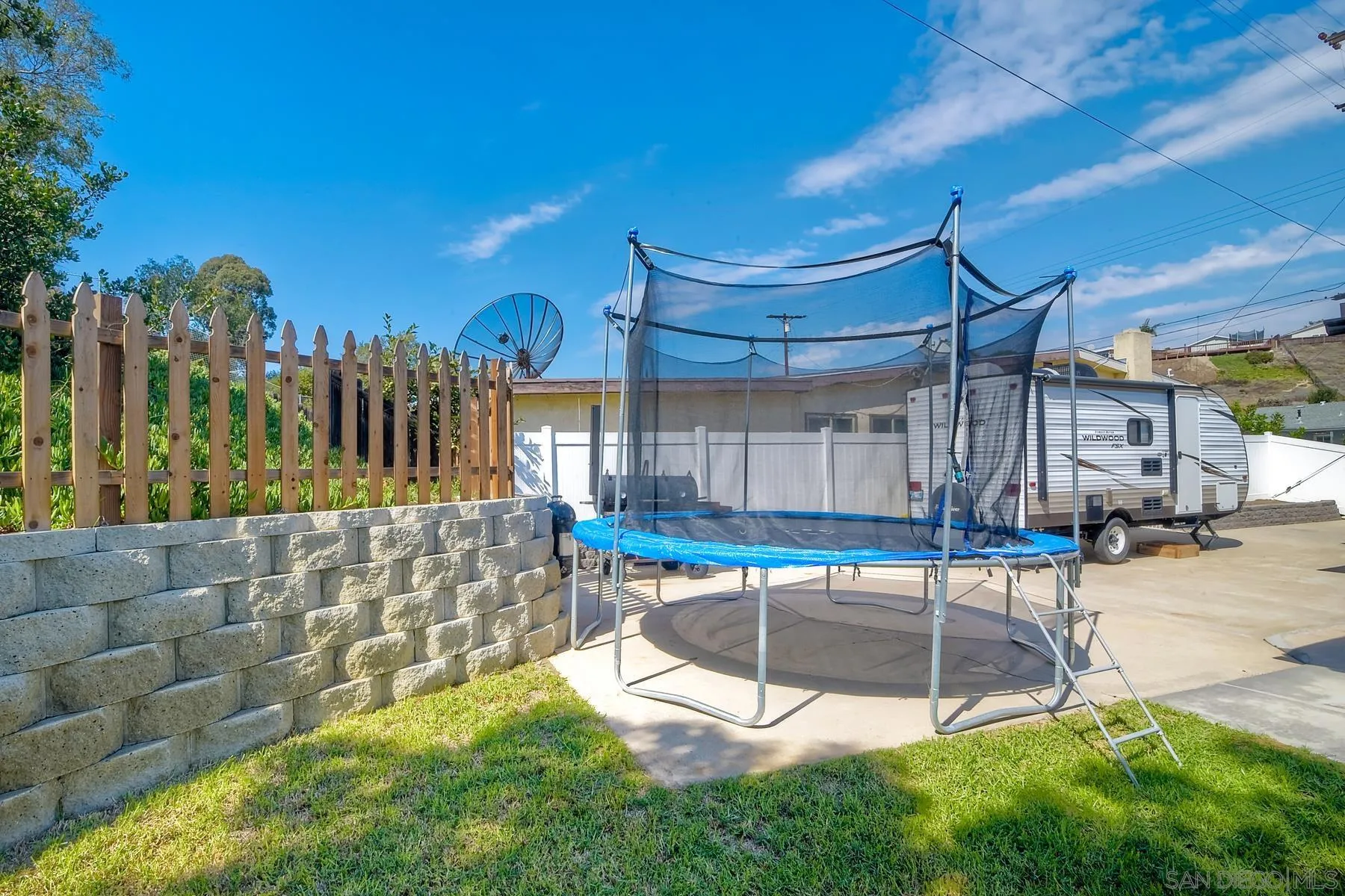2162 Rising Glen Way San Diego, CA 92139 - Photo 32 of 48 a view of a backyard with a patio