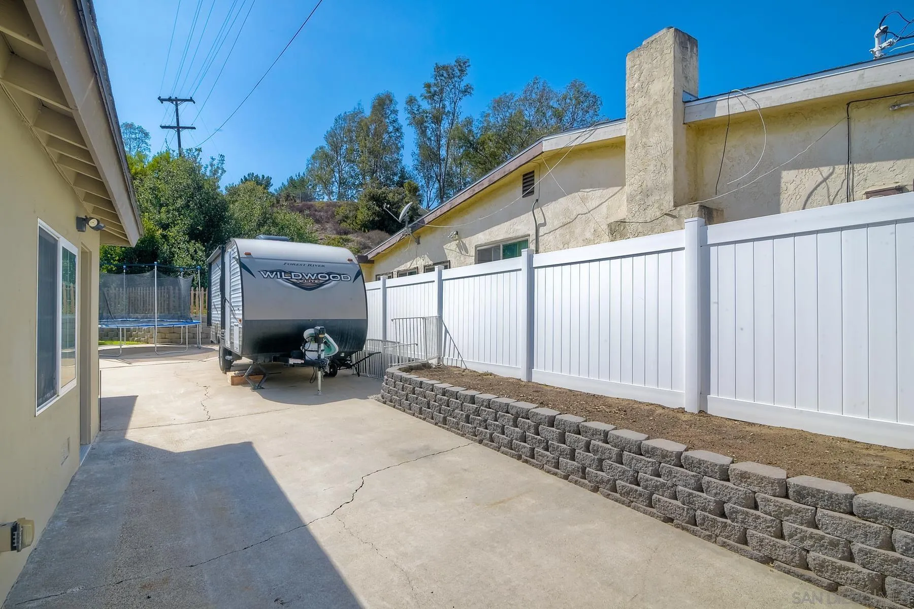 2162 Rising Glen Way San Diego, CA 92139 - Photo 34 of 48 a view of a house with a patio