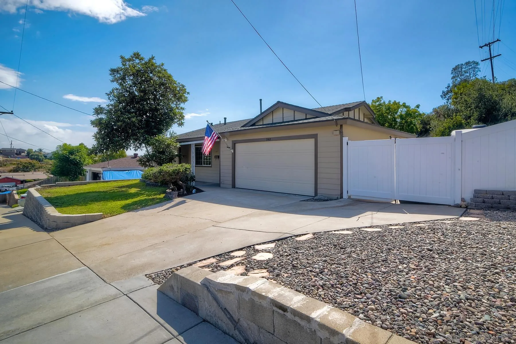 2162 Rising Glen Way San Diego, CA 92139 - Photo 35 of 48 a view of a house with a yard