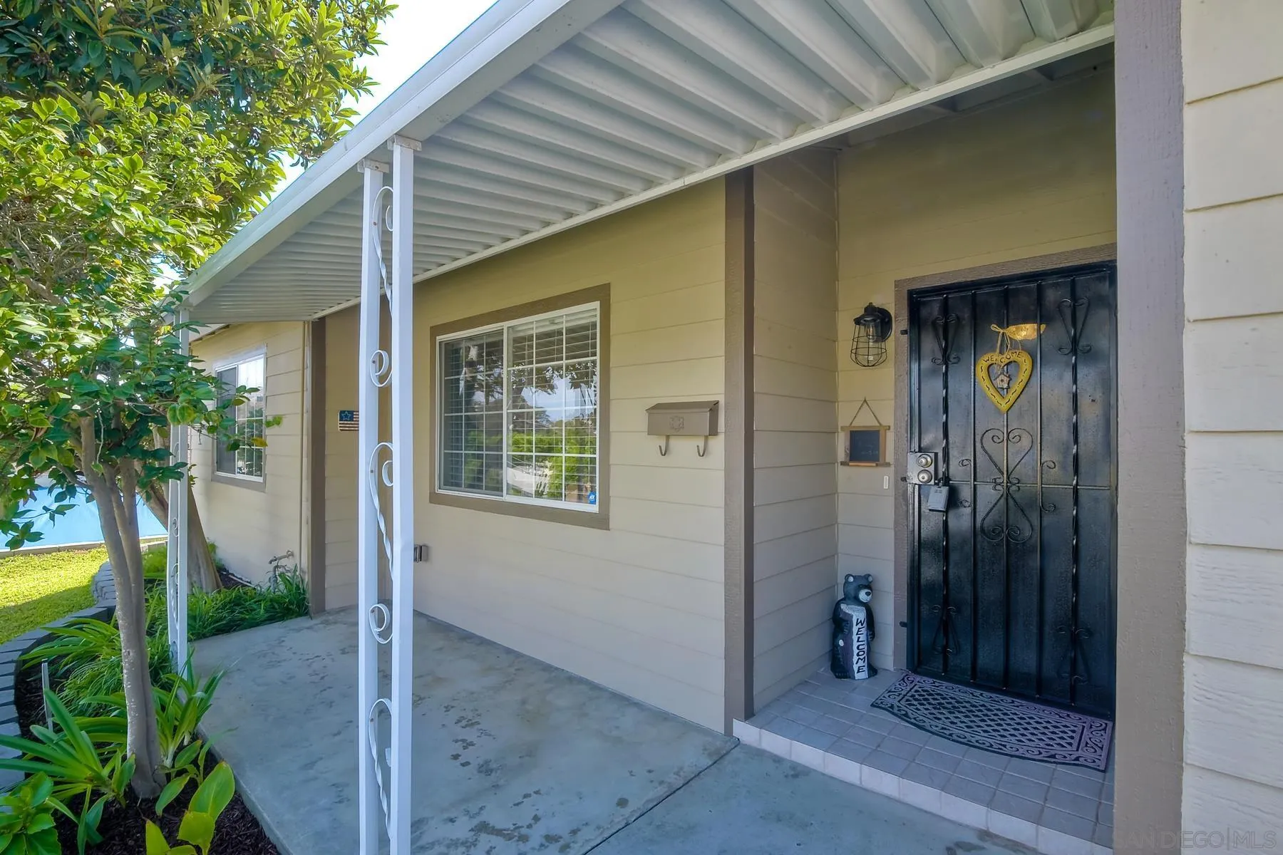 2162 Rising Glen Way San Diego, CA 92139 - Photo 37 of 48 a view of a house with a backyard