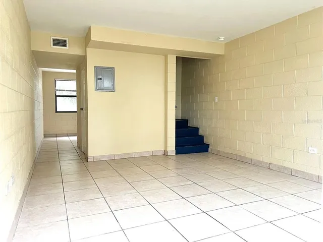 a view of a room with a window