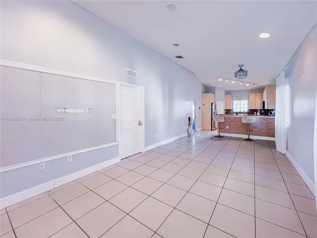 a view of a kitchen with a sink