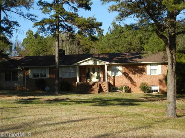 6307 Nat Road Julian, NC 27283 - Photo 1 of 15 Exterior Front. Lovely Large Brick House with 4.04 acres.