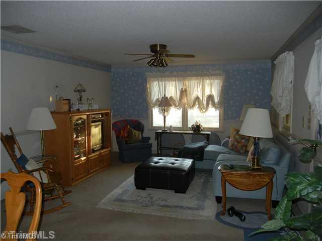 6307 Nat Road Julian, NC 27283 - Photo 3 of 15 Den/Family/Great Room. Upstairs Den area, comfortable and inviting.