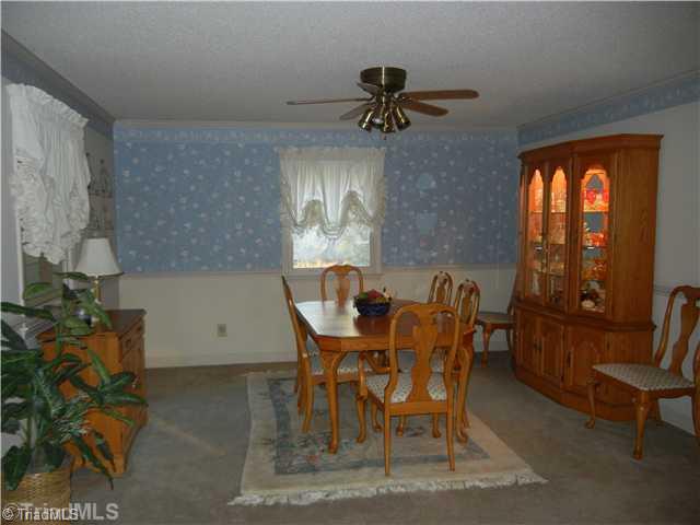 6307 Nat Road Julian, NC 27283 - Photo 4 of 15 Dining Room. Upstairs Dining room with lots of space.