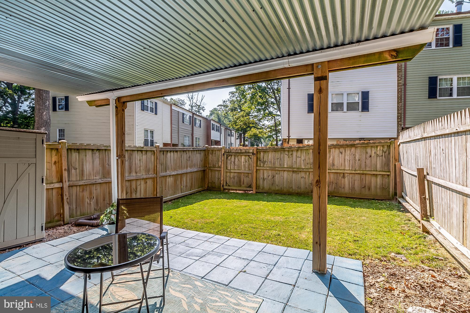 9705 Parkland Road Baltimore, MD 21234 - Photo 38 of 44 Covered patio and fully fenced yard