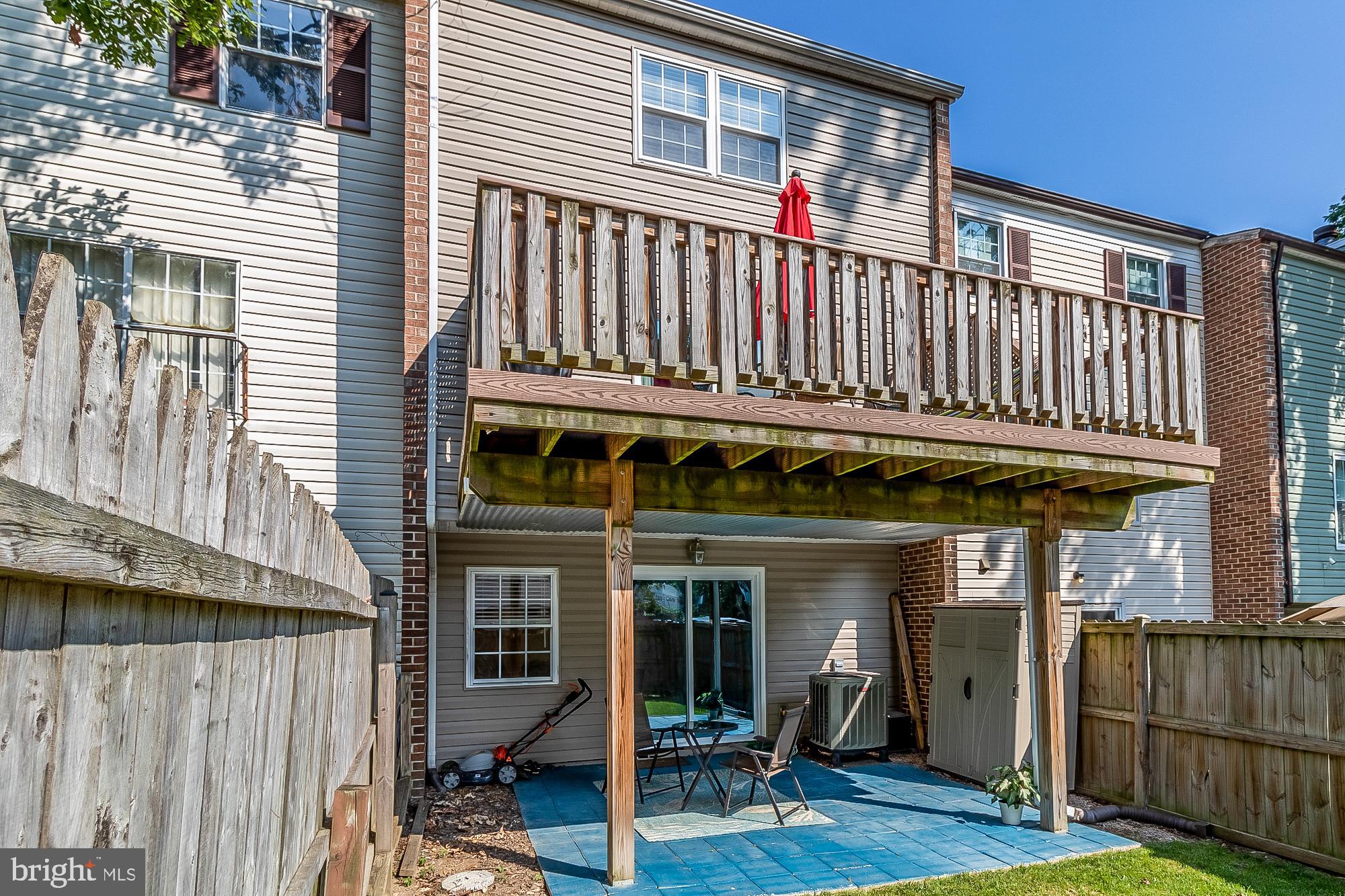 9705 Parkland Road Baltimore, MD 21234 - Photo 42 of 44 Nice large deck and concrete tile patio