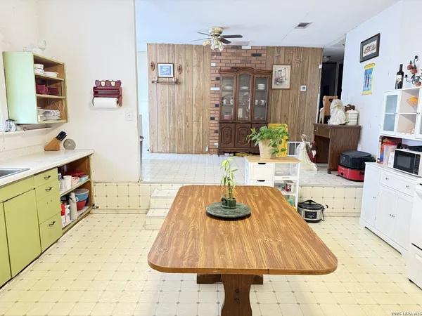 a room with furniture and a flat screen tv