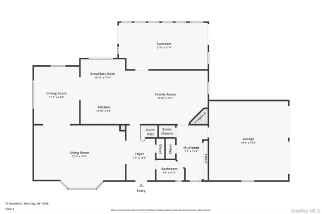 a view of a house with a yard and garage