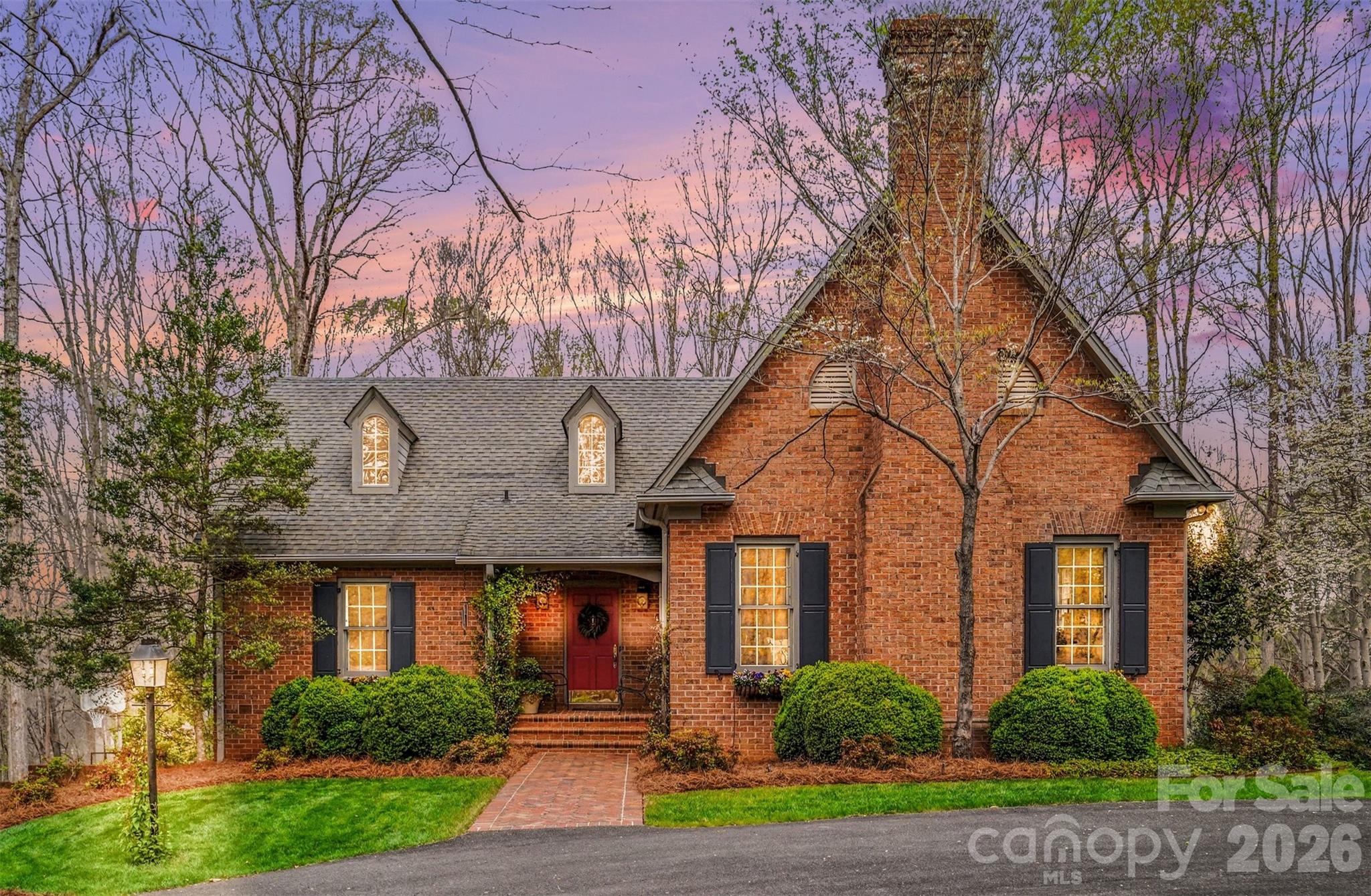 212 Deer Chase Road Shelby, NC 28150 - Photo 1 of 40 a front view of a house with a yard and potted plants