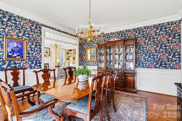 a view of a dining room with furniture and window