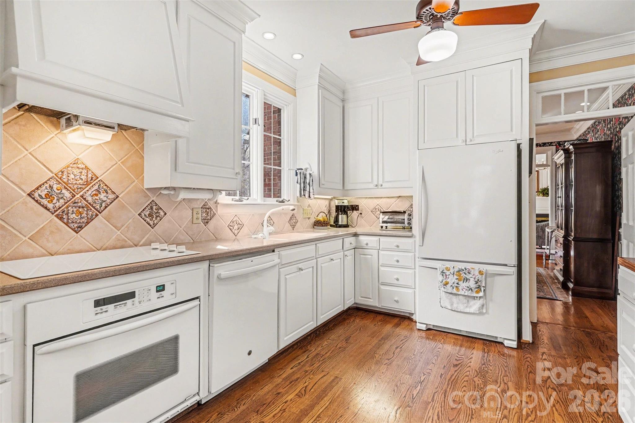 212 Deer Chase Road Shelby, NC 28150 - Photo 13 of 40 a kitchen with a refrigerator window and a sink