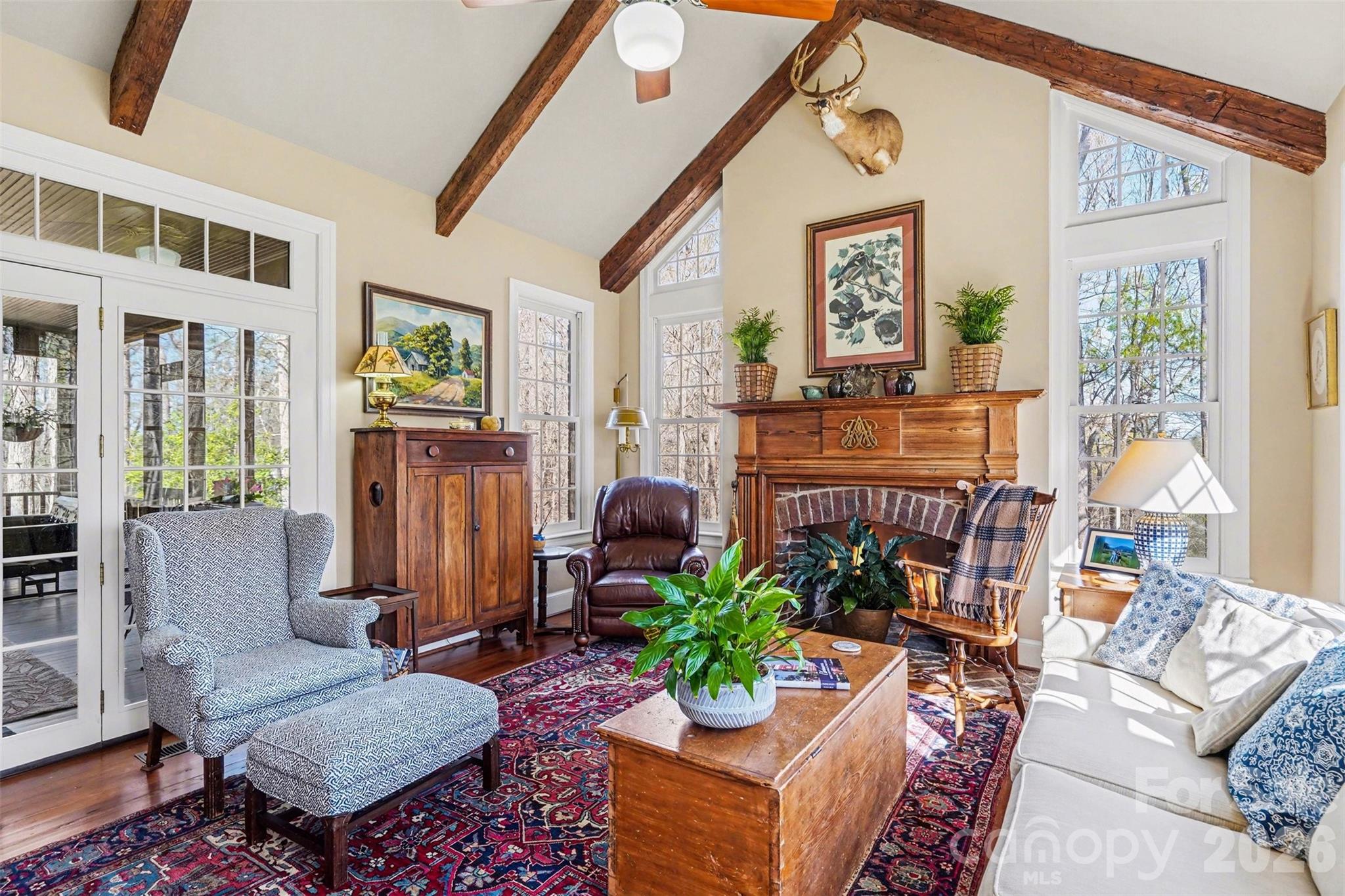 212 Deer Chase Road Shelby, NC 28150 - Photo 17 of 40 a living room with furniture a window and a flat screen tv
