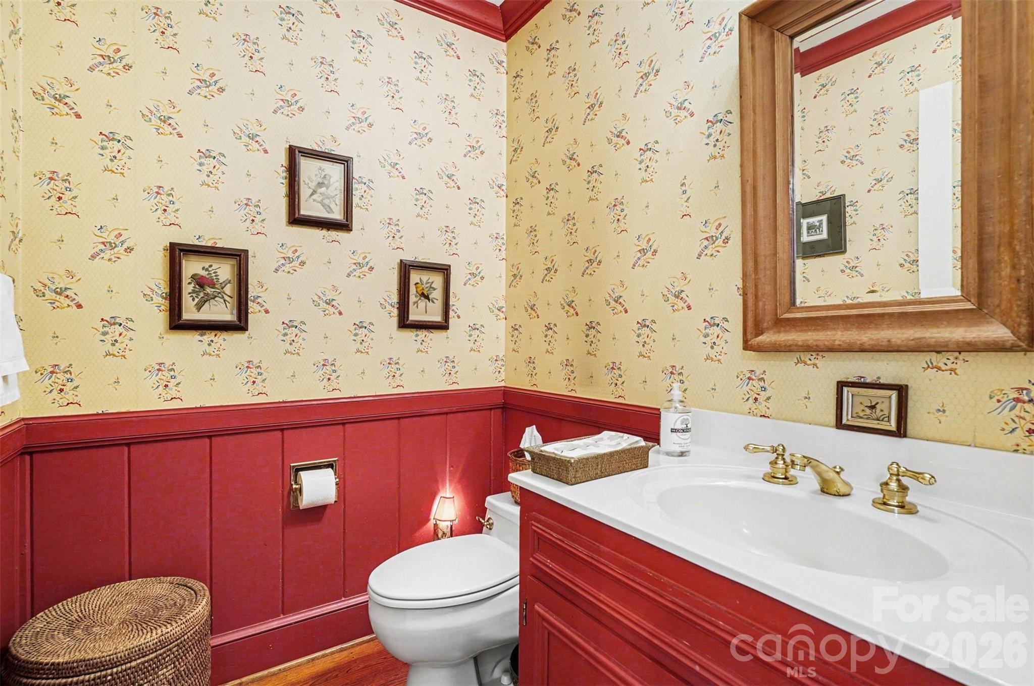 212 Deer Chase Road Shelby, NC 28150 - Photo 22 of 40 a bathroom with a sink a toilet and mirror