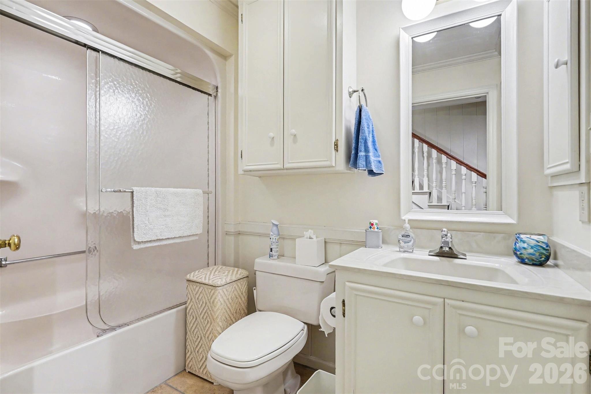 212 Deer Chase Road Shelby, NC 28150 - Photo 32 of 40 a bathroom with a sink a toilet and a mirror