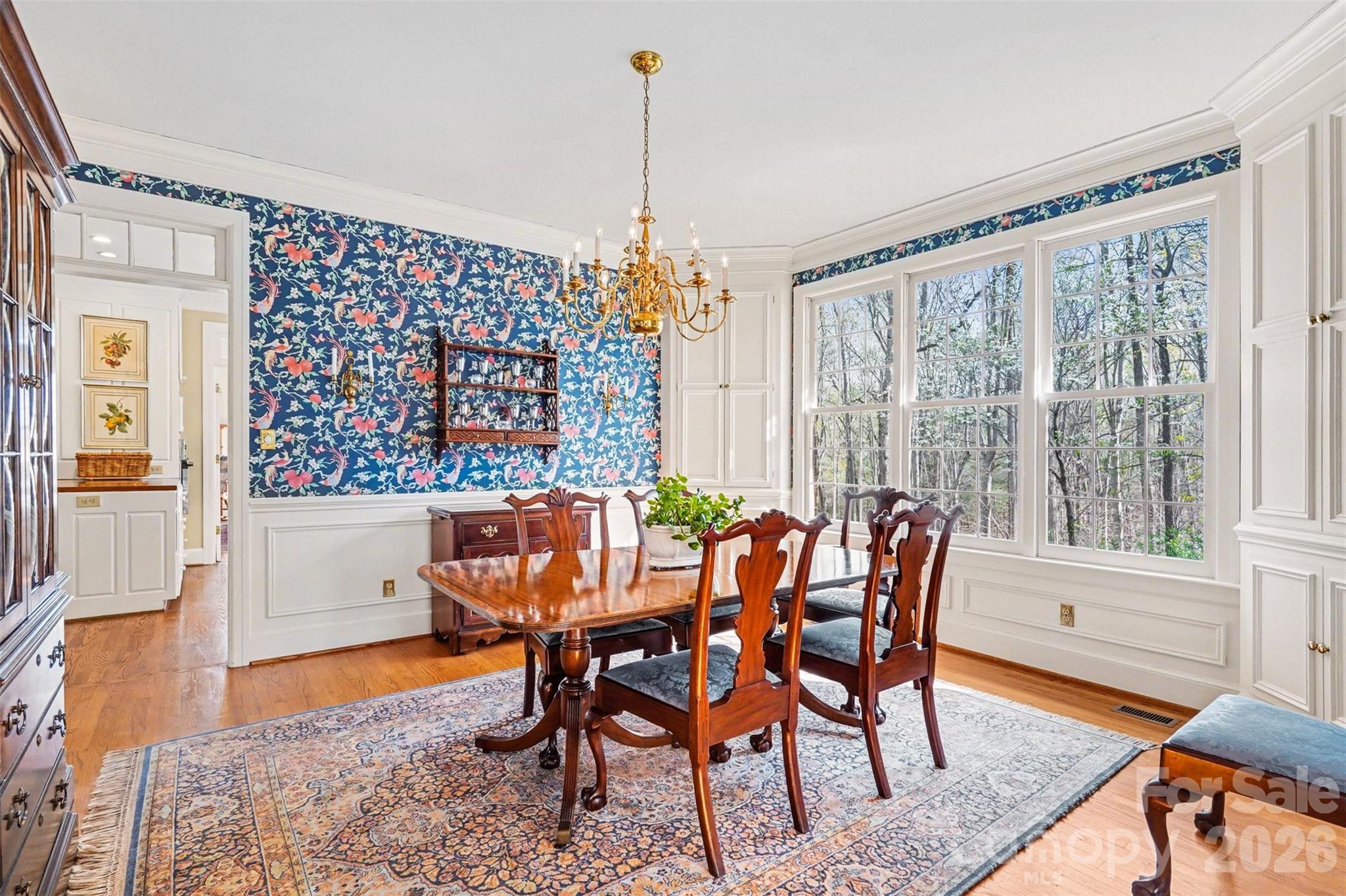 212 Deer Chase Road Shelby, NC 28150 - Photo 10 of 40 a view of a dining room with furniture window and wooden floor