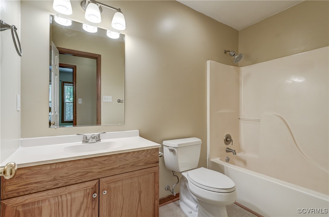 4509 Lockin Road Powhatan, VA 23139 - Photo 20 of 38 Full bath featuring toilet, vanity, bathing tub /
